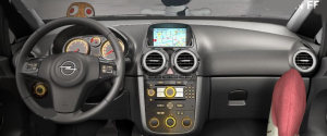 Intérieur de l'Opel Corsa :
Les aérateurs rond cerclés d'aluminium (ou plutôt de de plastique couleur d'aluminium... on n'est quand même pas dans une Audi) rappellent un peu l'univers de la Citroën C3. Mais le grand écran couleur du GPS nous montre qu'on est dans un véhicule à l'intérieur beaucoup plus soigné.
.